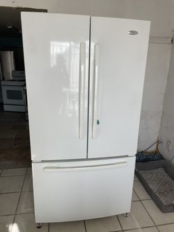 Whirlpool Fridge White.  Spacious In Good Condition 