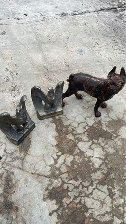 Two vintage cast-metal eagle/bird bookends and French bull dog