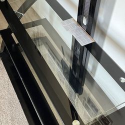 Very clean TV mount and glass shelves