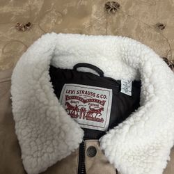 New never used or tried on. Mens size small. Brown Faux Leather  Levi’s jacket.