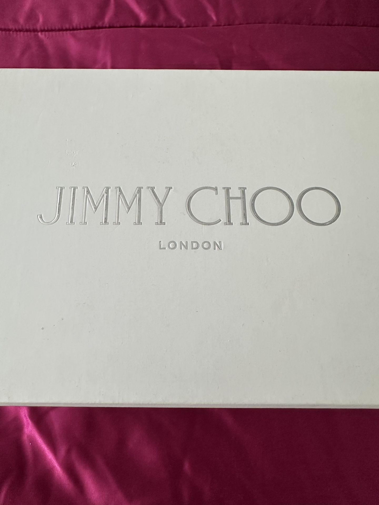 Jimmy Choo shoebox with their label tissue and other extras