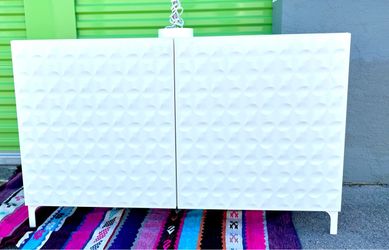 White Two-Door Cabinet with Textured Front