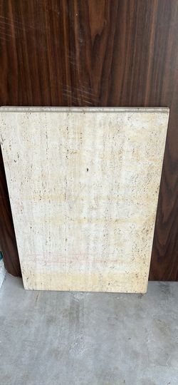 Two pieces of granite, some form of stone