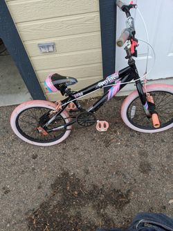 Girls BMX bike with front foot pegs