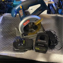 Ryobi 5 1/4 Inch Saw With Battery And Brand New Charger