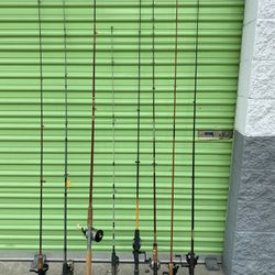 LOT OF FISHING RODS WITH REELS