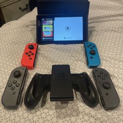 Nintendo Switch V2 Neon JoyCon Console Bundle w/ Extra Gray JoyCons w/ JoyCon Grip