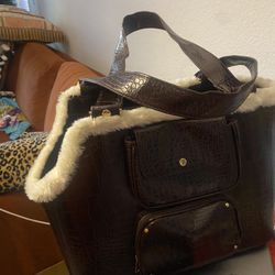 Large purse for a small pet like a small dog cat
