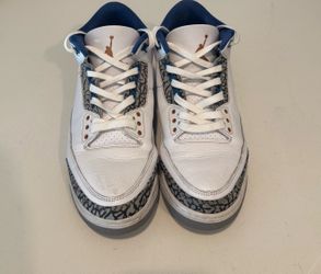 Nike Air Jordan 3 Retro "Washington Wizards" sneakers, featuring white leather with blue accents and signature grey elephant print.