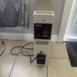 Two portable radiator space heaters