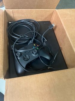Microsoft Xbox One X comes with cords and controller like new
