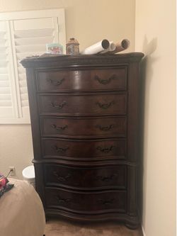Brown tall dresser