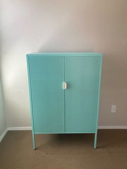Green metal cabinet