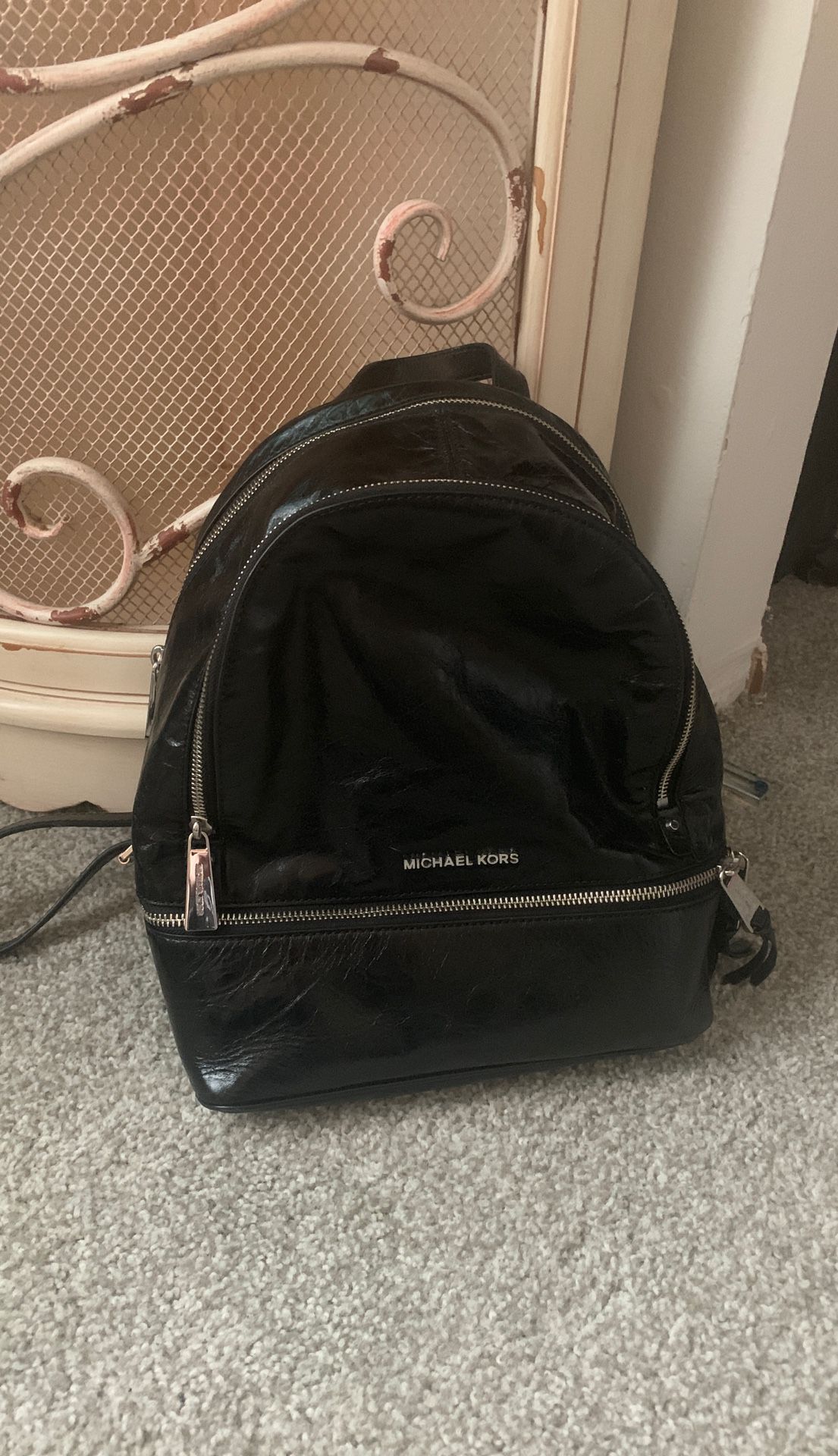 Authentic Michael Kors black leather backpack