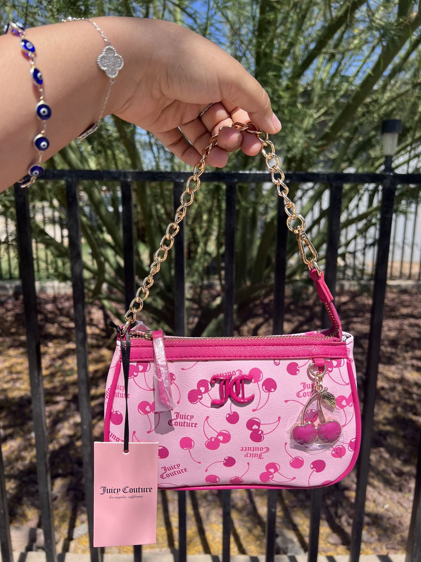 Juicy couture pink cherry wristlet