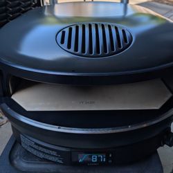 LIKE New Black Gozney Arc XL Propane Outdoor Pizza, clean stone