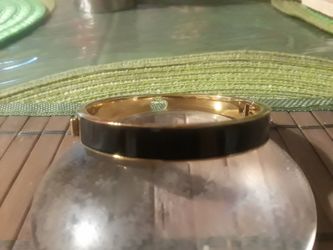 Kate spade bracelet blk with gold trim   !
