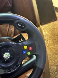 Xbox steering wheel and pedals.