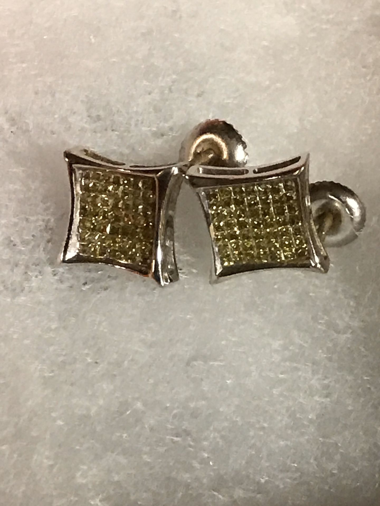 yellow diamond earrings in white gold