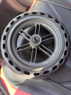 universal electric scooter wheel 8.5x50 size. Has solid tire. Comes with 6001RS bearings. $15 OBO