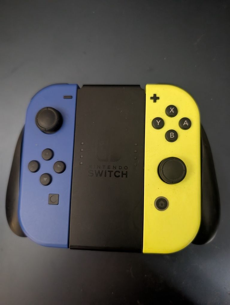 Neon Blue Neon Yellow Nintendo Switch Joycons And Grip