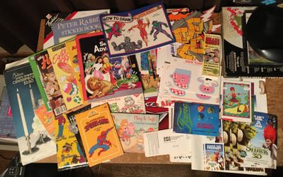 Huge lot of kids coloring and activity books posters Hershey Spider-Man Care Bear Shrek monsters Inc pagemaster Peter rabbit superheroes cars scholast