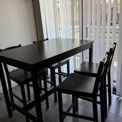 IKEA HÄGERNÄS Bar table and 4 bar stools, black stained pine
