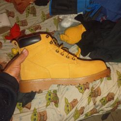  Wolverine Boots And 48 Volt Battery. 