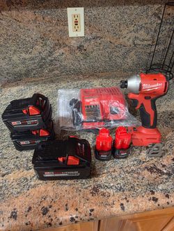 Milwaukee M18 & M12 Tool + Battery Bundle – Impact Driver, 5 Batteries & Charger – $365