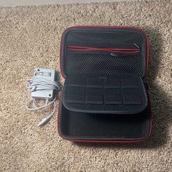 Nintendo 3DS case with charger and game slots