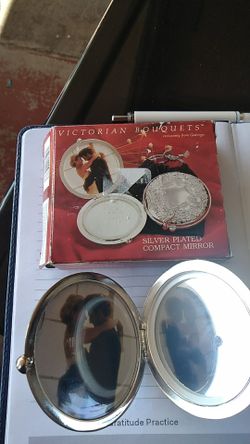 Compact silver plated mirror