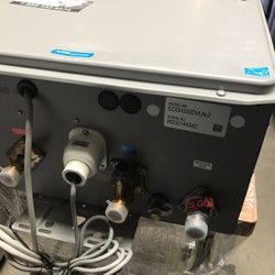 Indoor Tankless  Water  Heater  Brand New Small Dent $550 Tax Included 