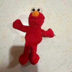 Sesame Street Elmo red plush toy