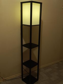 Floor lamp with shelves