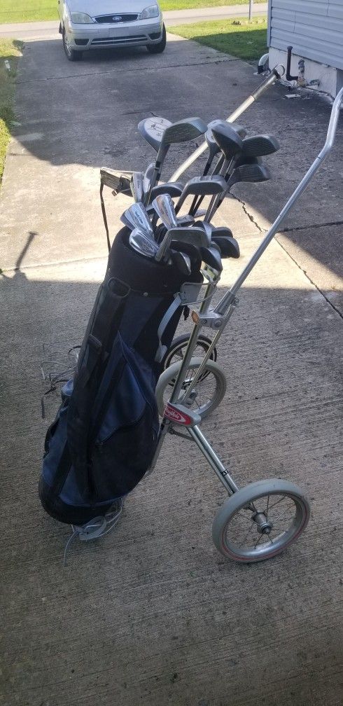Golf Clubs And Caddy