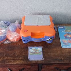 VTech https://offerup.com/redirect/?o=Vi5TbWlsZQ== TV Learning System Console (2004) ● Like New, Never Used ● Soccer Challenge Game ● 1 Controller ● N