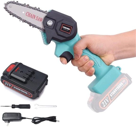 Mini Chainsaw New In Box With Accessories

