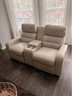 Electric leather reclining sofa