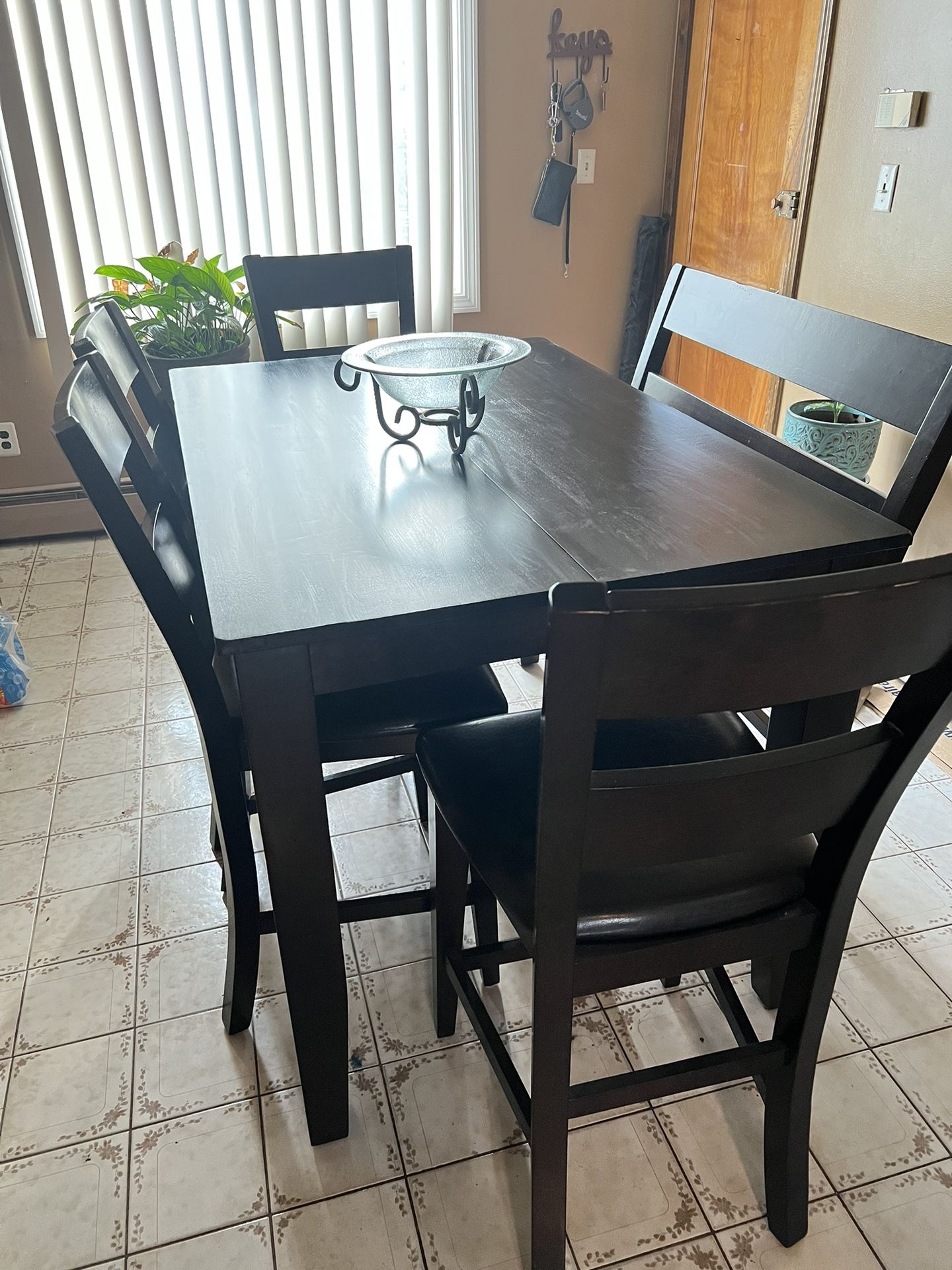 Kitchen Table With Four Leather Chairs And A Leather Bench 