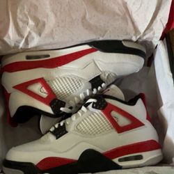 White and red Jordan 4 
