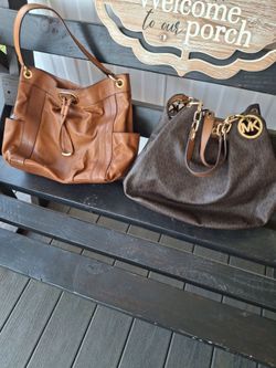 Bolsas buenas condisiones mk original $30 y $25