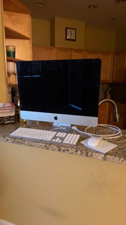 Apple iMac with Keyboard, Trackpad, and Mouse
