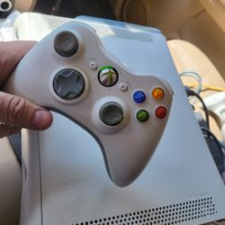 Xbox 360 system with controller and cords working perfectly in every way.