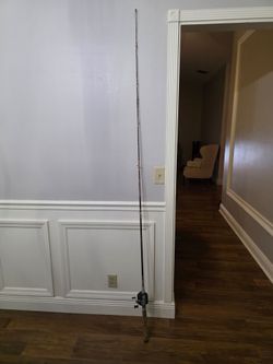 Vintage 7 foot fishing pole real combo not sure of brand similar to Zebco