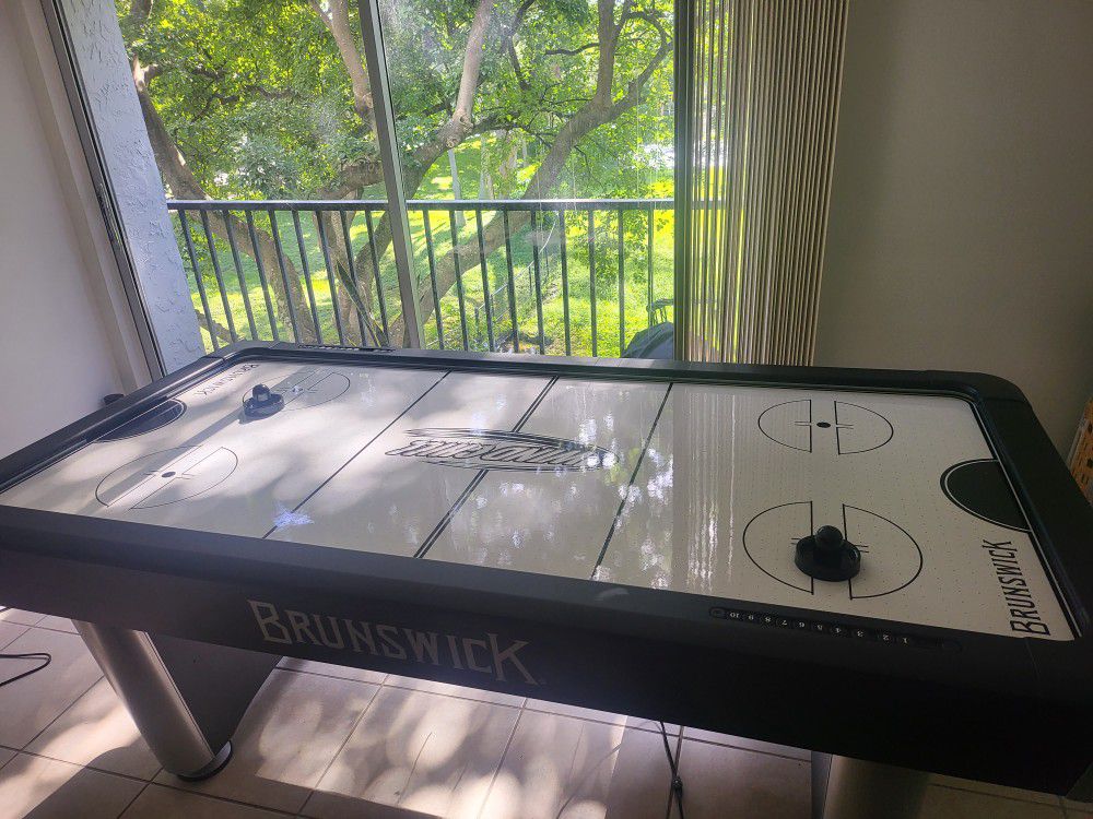 Air  Hockey Table

by Brunswick Billiards. Wind Chill