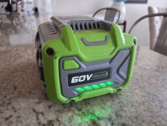 New 60 volt battery with charger included $80 no less firm
