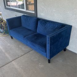 Blue suede couch