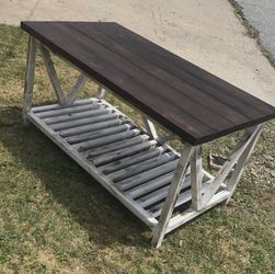 Freshly Built Farmhouse Style Coffee Table. Freshly Built Farmhouse Style Coffee Table. 52 inches long 25 inches tall and 26 inches wide. It's a whi