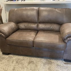 Faux leather Loveseat - Never Used