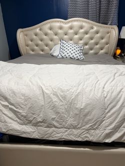 Elegant cream upholstered bed